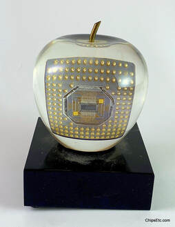 Apple Computer paperweight with processor inside 