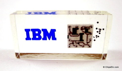 image of an IBM paperweight wirh system 360 computer SLT logic chip from 1964