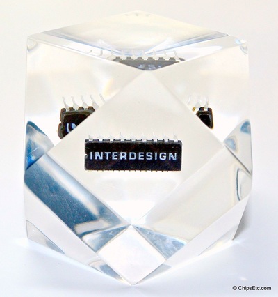 Interdesign integrated circuit chip paperweight