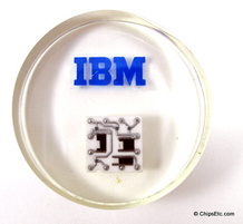 image of an IBM paperweight with a System 360 computer SLT solid logic chip