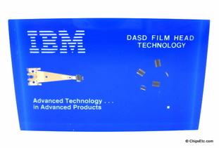 IBM paperweight with a 3370 DASD thin-film disk head for system 38 4331 4341 computers