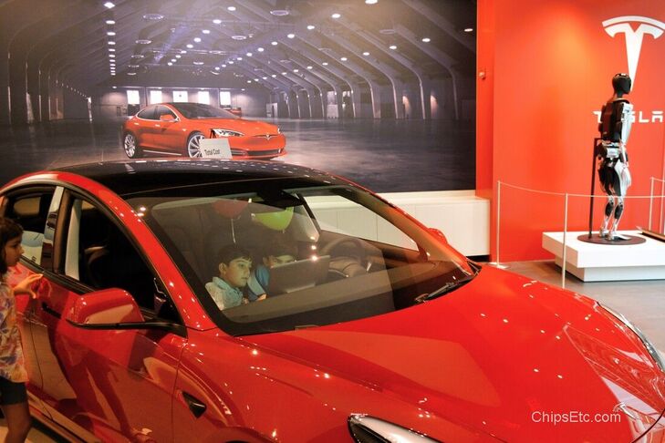 Tesla  Optimus bot Robot car showroom