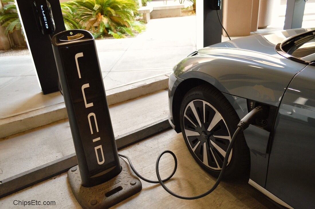 Lucid Air EV electric car plugged in charging station