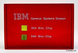 IBM paperweight with a 4300 computer with 32k 64k bit memory chips